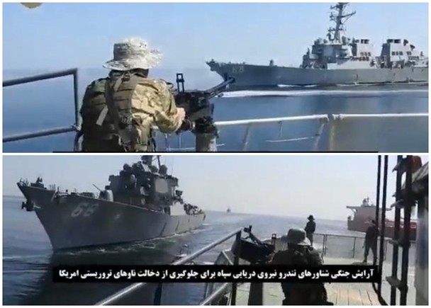 伊朗革命卫队士兵执枪瞄向美国军舰。
