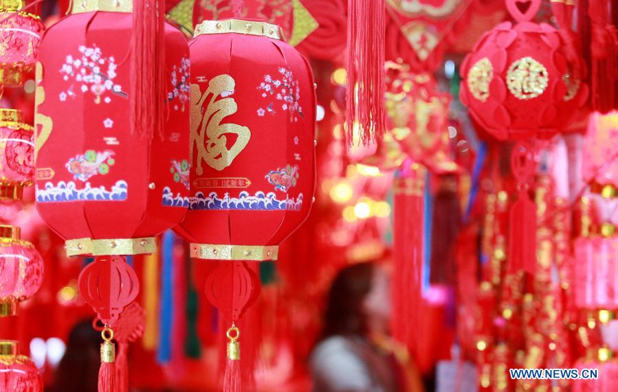 Lunar richmond aberdeen People shop for Chinese Lunar New Year decorations at market in