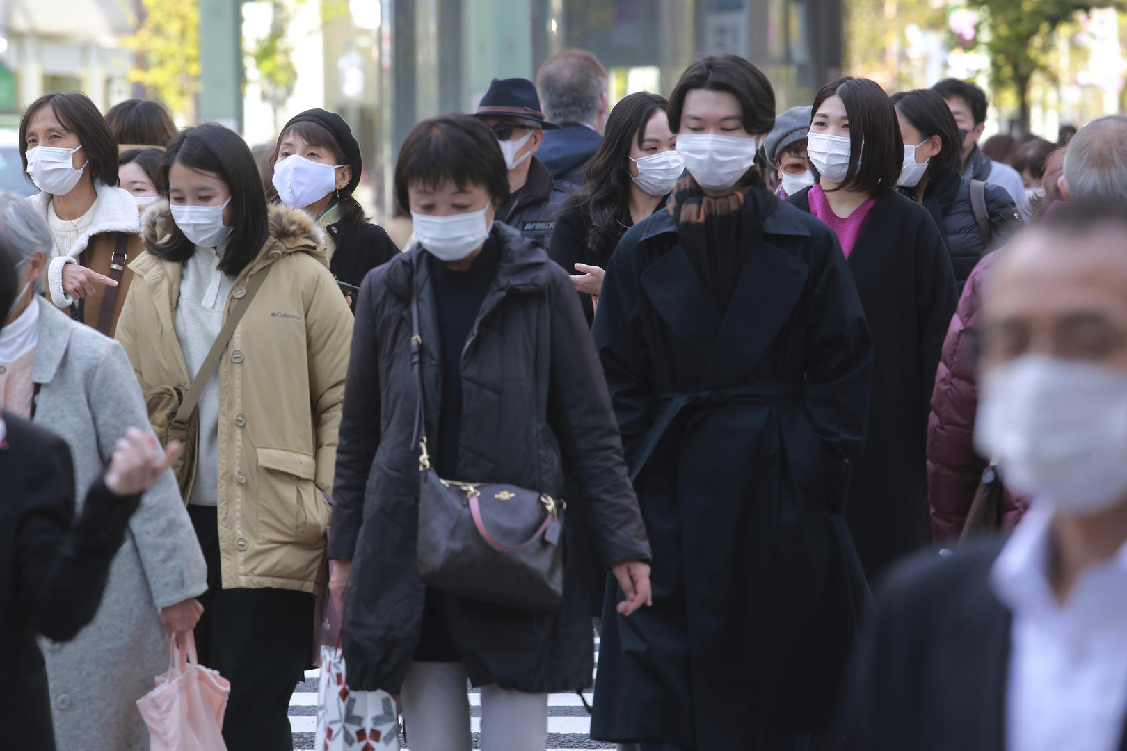 ↑11月29日,日本东京街头。图据视觉中国
