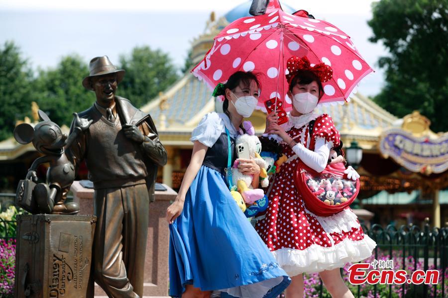 <p>Visitors are seen at the Shanghai Disney Resort as it reopens on June 30, 2022.  (Photo: China News Service/Tang Yanjun)</p>
