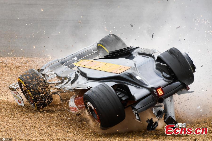 <p>Alfa Romeo's Zhou Guanyu of China crashes out at the start of the British Formula One Grand Prix at the Silverstone circuit, UK, July 3, 2022. (Photo/ICphoto)</p>