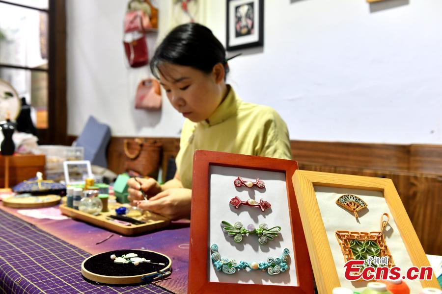 <p>Xu began to learn the techniques of hand-made Chinese knot buttons in 2012 and opened her own studio in 2014.  

</p>
