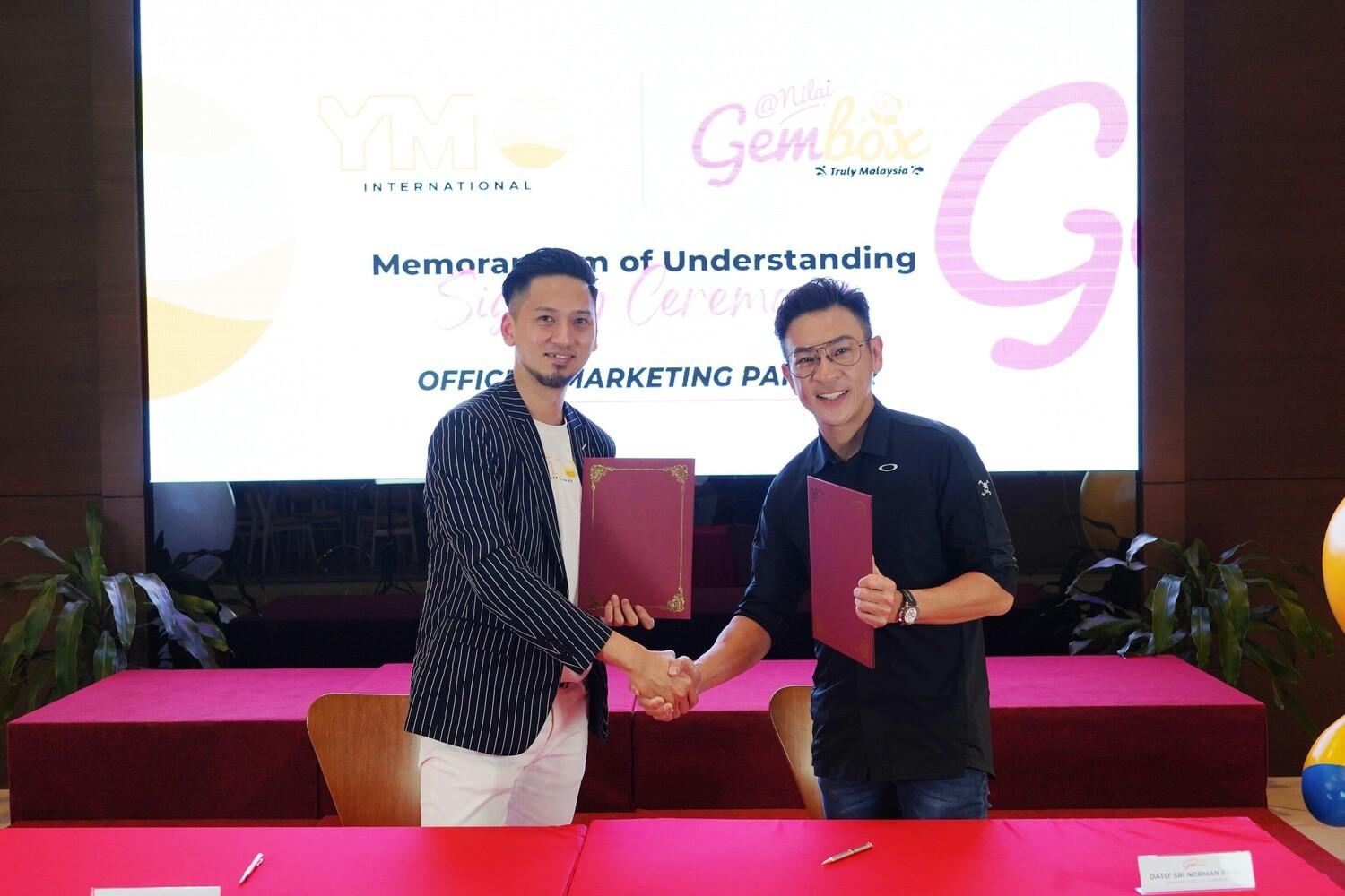 (左为优盟国际首席市场战略顾问姚明荣,右为GEMBOX董事执行长拿督彭建伟。)
