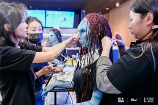 上图为陈声杰(左2)和他的造型设计专业团队
