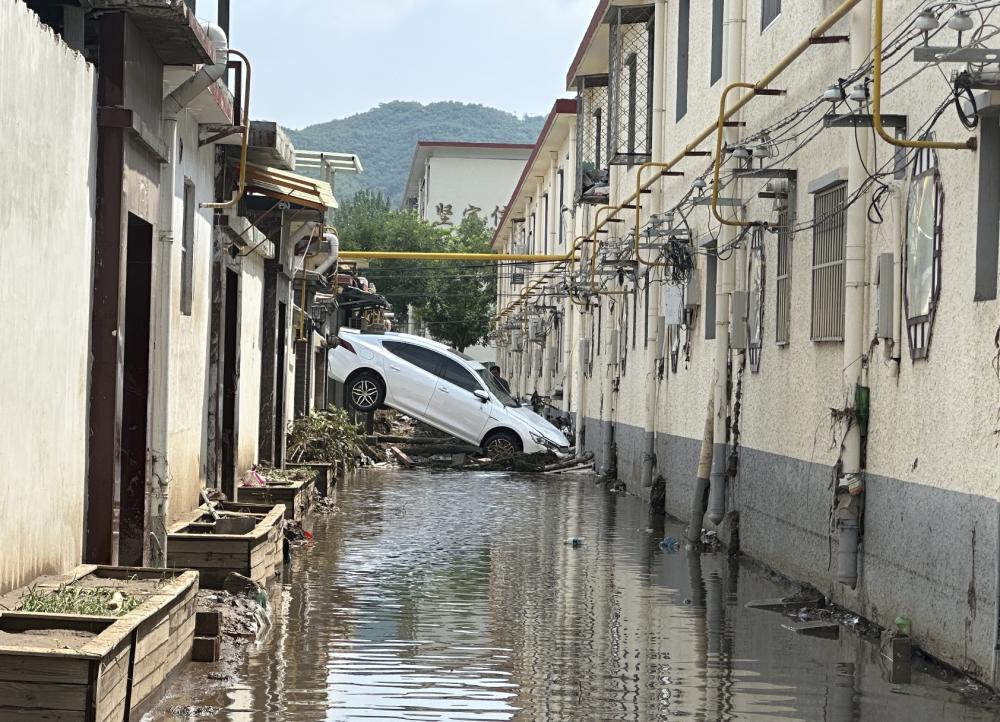 21现场｜门头沟受灾乡镇私家车受损严重，有4S店称修车要等2个月