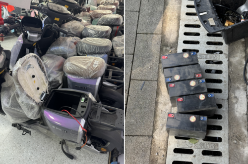 电动自行车座椅下方可装入5块电池。(易民/摄)