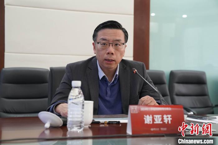 18日,招商证券研究发展中心副总监谢亚轩在中新社国是直通车举行的“2024年三季度经济形势分析会”上发言。 赵斌 摄