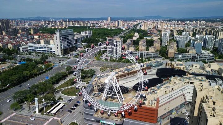 这是龙口市城区（7月2日摄，无人机照片）。