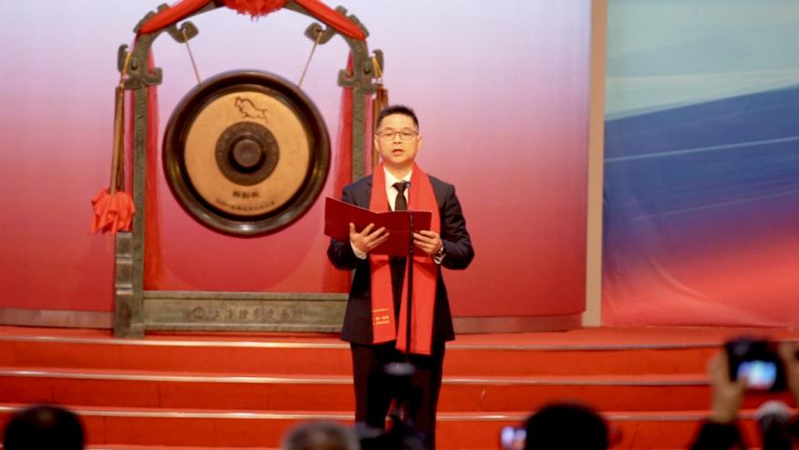 强一股份董事长 周明