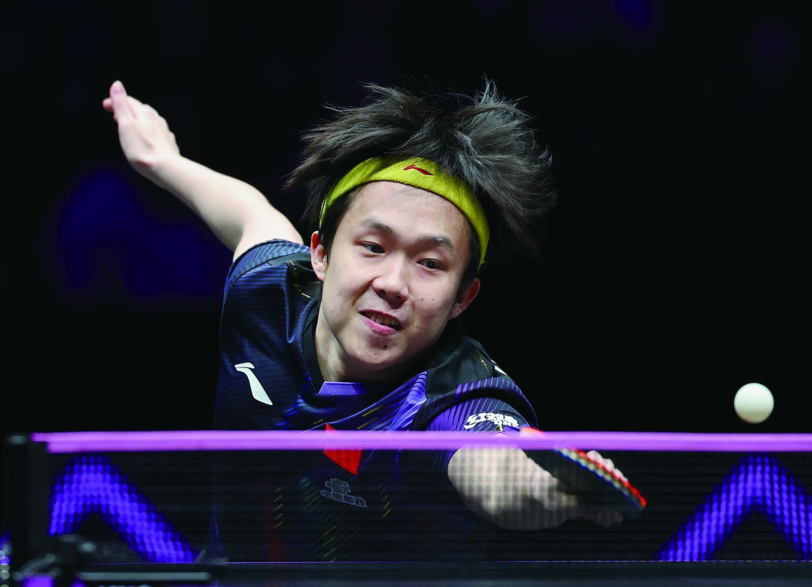 王楚钦在比赛中 新华社发