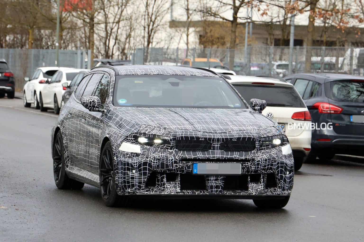 全新设计、V8 声浪，宝马 M5 旅行版中期改款测试车曝光