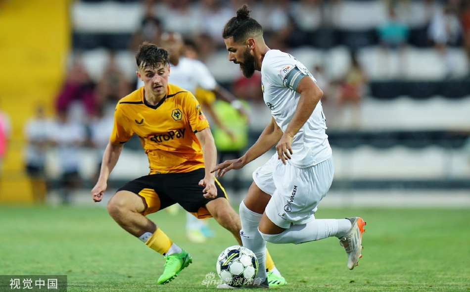 夕阳余晖洒在绿茵场上，双方球员身影被拉长，友好地相互致意或交换球衣，为这场激烈的友谊赛画上充满敬意的句号。