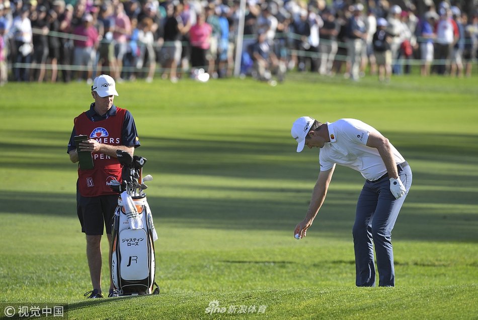 罗里·麦克罗伊潇洒完成收杆动作，身躯扭转如弓，力量与美感完美融合
