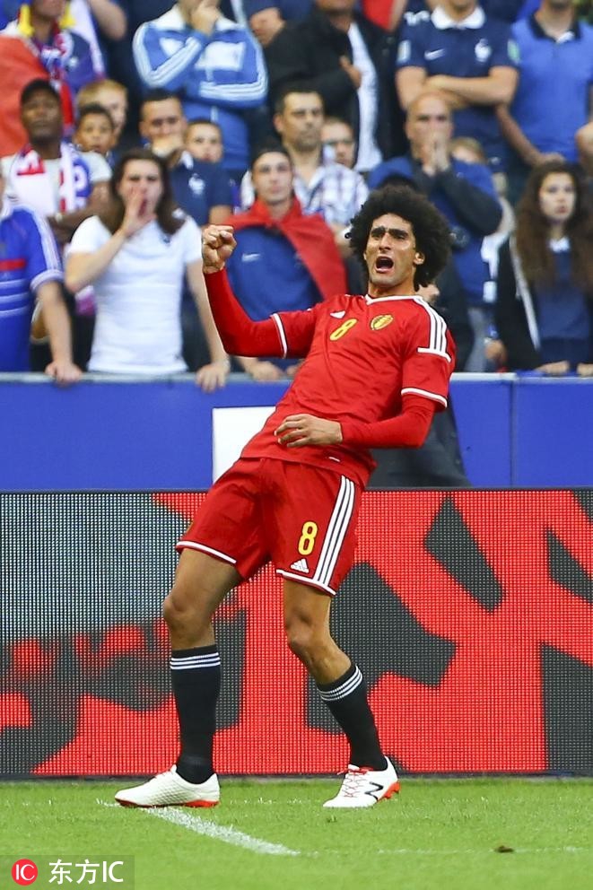 费莱尼个人社交平台的发文截图，密密麻麻的文字记录了他对国家队生涯的回忆与感谢，背景是他身穿红色球衣的剪影，透露出浓浓的告别氛围