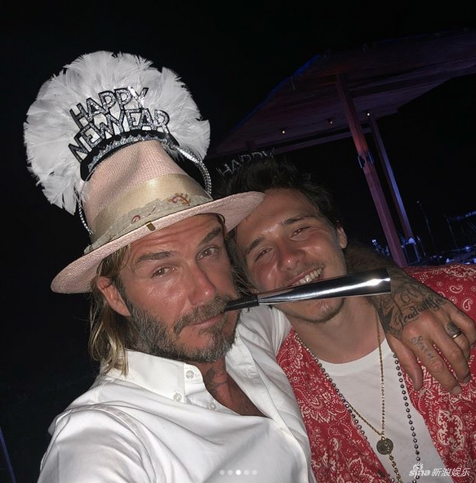 贝克汉姆搂儿子合影搞怪5连拍