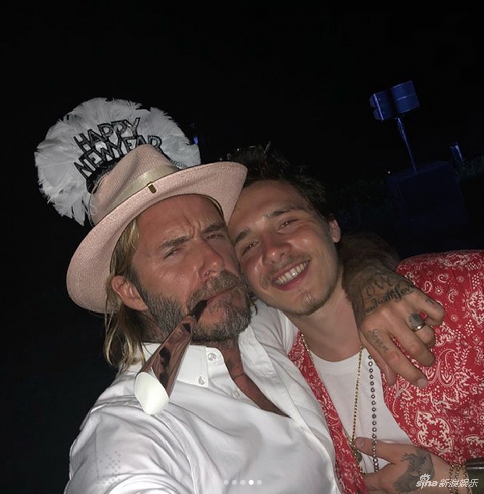 贝克汉姆搂儿子合影搞怪5连拍