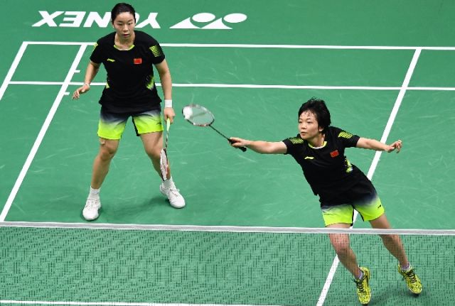 陈清晨（右）/贾一凡在2018年世界羽毛球锦标赛女双四分之一决赛中。新华社记者季春鹏摄