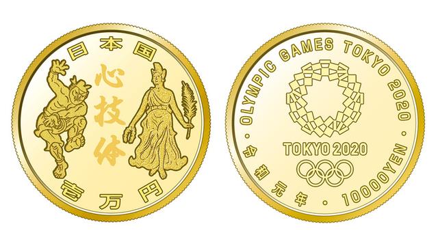 一万日元金货币的正面为胜利与荣光的主题图案,背面为2020年东奥会的logo