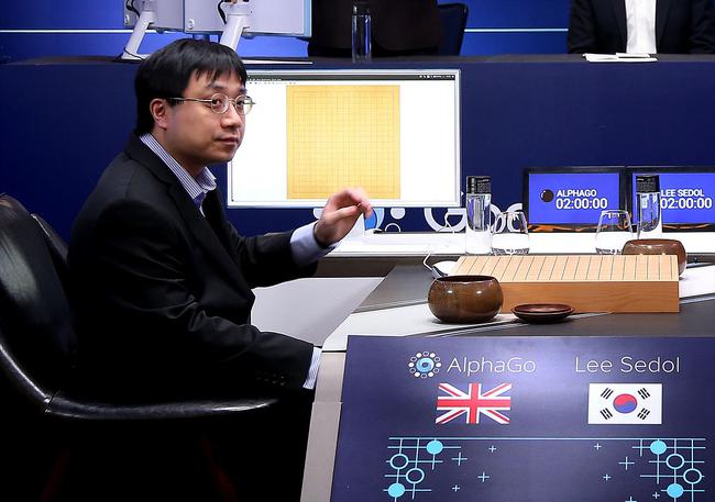 AlphaGo的“人肉臂”黄士杰