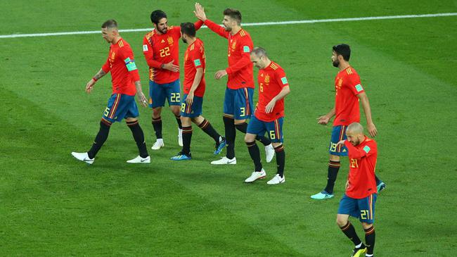世界杯-替补射手补时救主 西班牙2-2平头名晋级