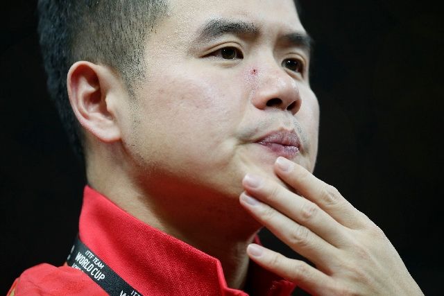 资料图,乒乓球世界杯团体赛男子小组赛,中国男队教练刘国正在比赛中观战。 新华社发(蒂姆·爱尔兰摄)