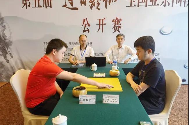 周振宇2比1战胜马天放,卫冕过百龄杯“棋王”