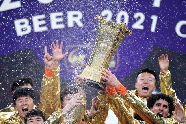 中国足球未来是泰山模式 既舍得投入又相对理性