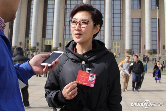 全国人大代表,西安广播电视台节目主持人孙维
