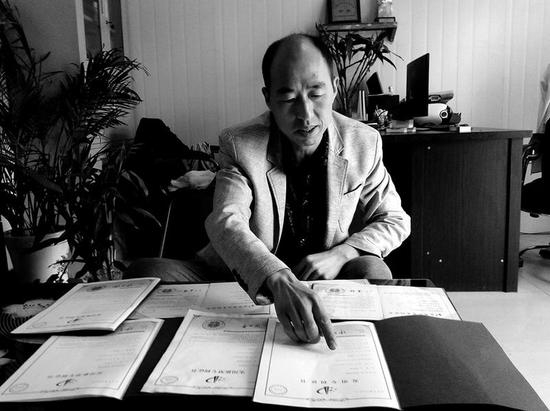 李鋒周向記者介紹專利申報(bào)情況