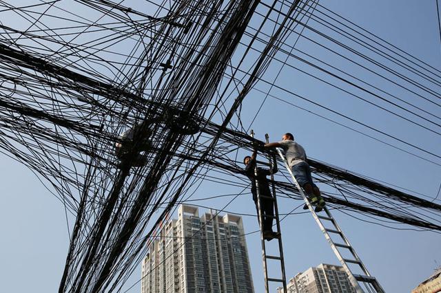 都市“蜘蛛网”上的“蜘蛛人”