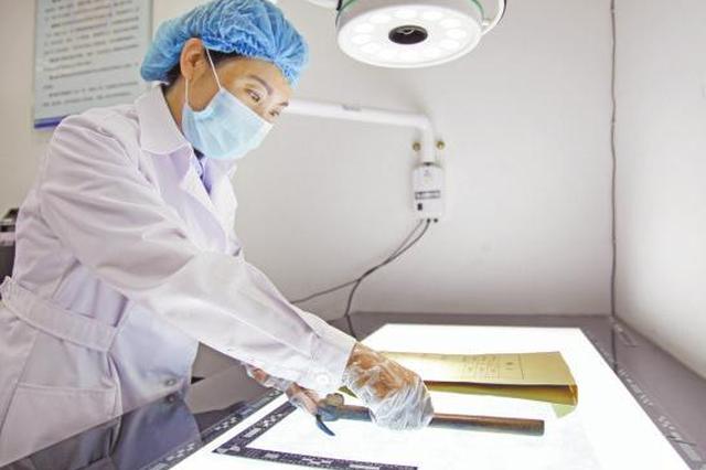 女法医18年解剖尸体200余具 用DNA破案250余起