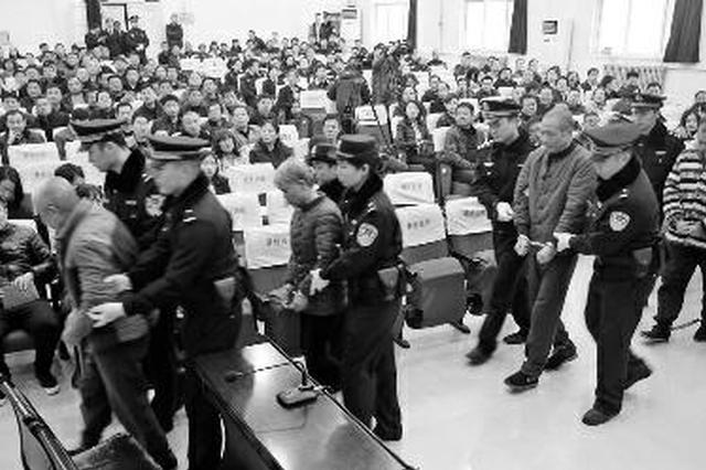 5人摆摊抽奖骗取农民工钱财 行骗时抢劫2千获刑