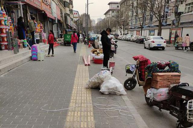行道树缠铁丝信号灯没有启用 乐游路这些问题待解决