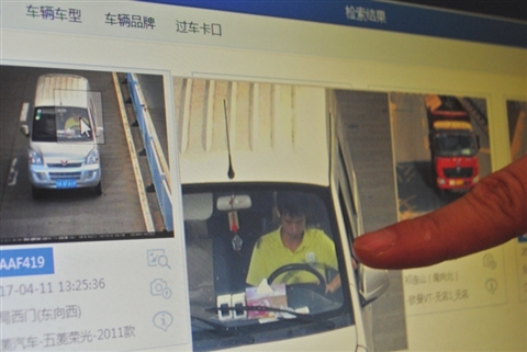 “海燕”系统能分析车辆图片里更多的细节信息,图中驾驶员没系安全带的情况一目了然。 □记者 周建越 摄