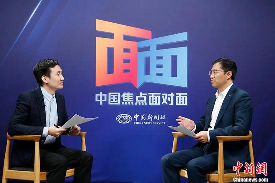 中国国家航天局探月与航天工程中心副主任、中国首次火星探测任务新闻发言人刘彤杰接受中新社