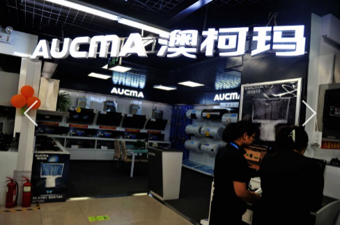 澳柯玛冰柜怎么样 山东青岛一家电器商场内的澳柯玛家用电器专卖区。(视觉中国)