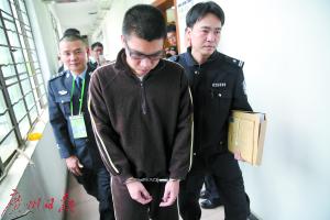 嫌疑人被逮捕。广州日报全媒体记者邵权达 摄