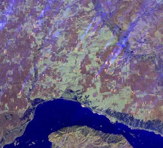 图7哈尔滨地区遥感假彩色图，可以看出有大量秸秆燃烧点（卫星数据：Landsat-8）