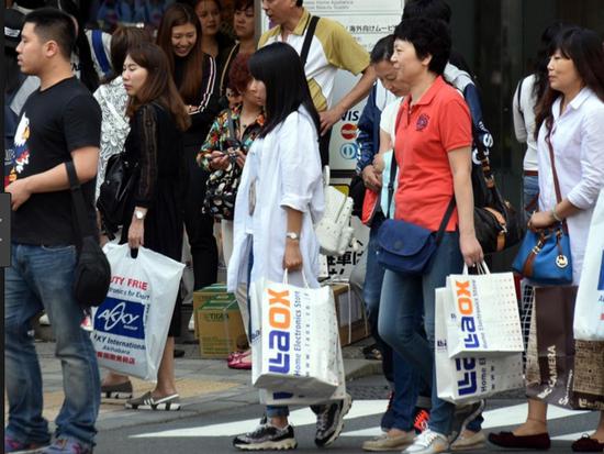 外媒：中国游客出境游 带来了移动支付与商业竞争