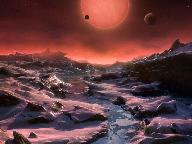 图中是艺术家描绘的一颗系外行星表面结构，这颗行量体积的表面温度分别类似于金星和地球，像这样的系外行星将成为天文学家搜寻地外生命的理想目标之一。