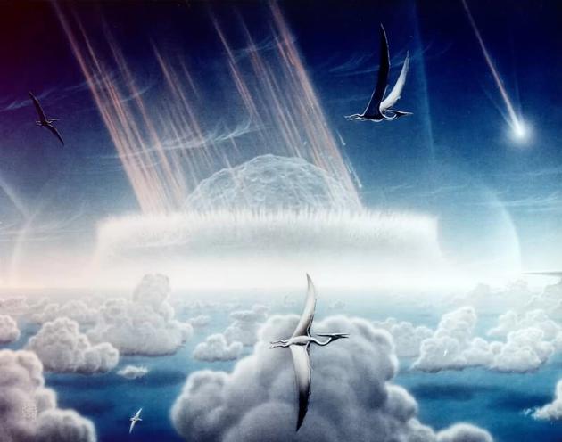 图中是艺术家描绘的0.65亿年前小行星碰撞地球，当时这场灾难导致恐龙灭绝消失