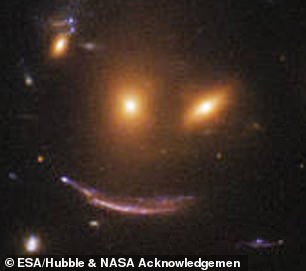 NASA指出，这张“微笑的嘴”是光线效果产生的