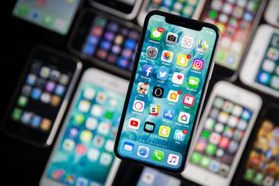 ���������ձ�����ƻ���������ĻiPhone�ƶ�ӯ������