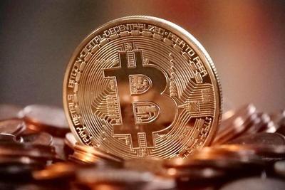 连番暴涨的比特币迎来首个期货交易 华尔街心态复杂 [正面]