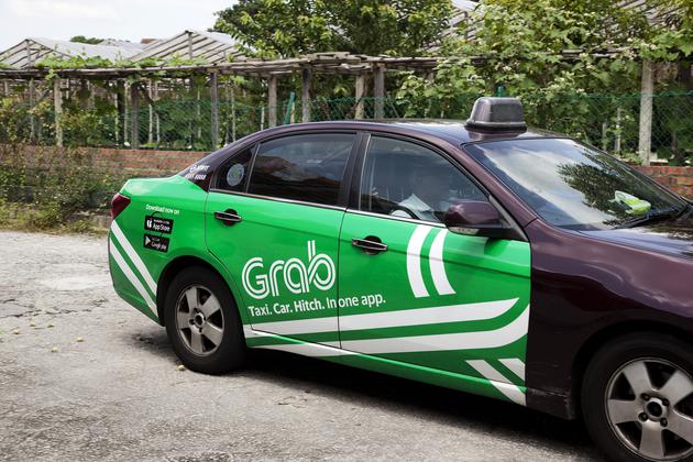 传共享出行企业Grab将收购Uber东南亚业务
