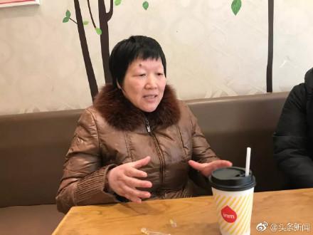 图为李国勤