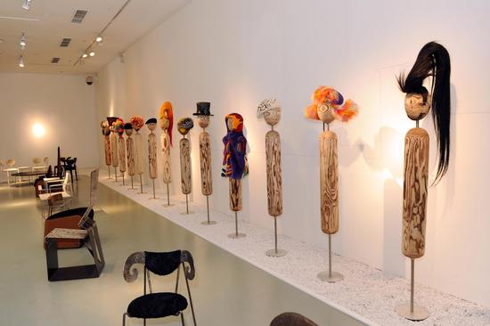 当木头优劣版式:爱上设计师朱小杰栖息作品展皮草设计作品家具图片