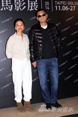 王家卫导演(右)与老婆陈以靳