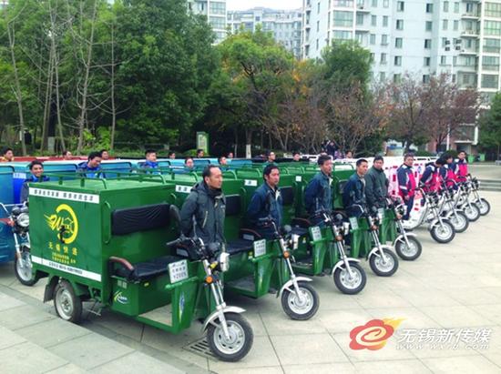 全市建立14个快递服务平台 50辆标准快递三轮