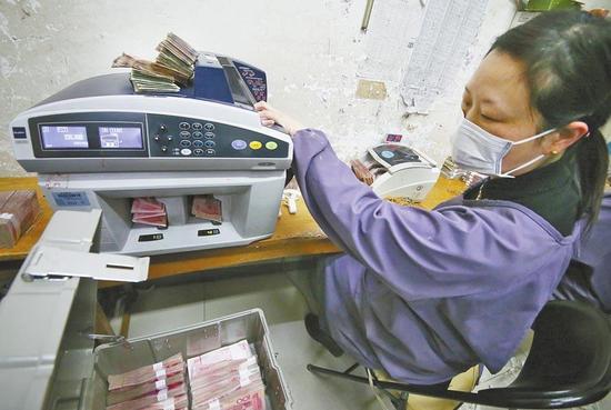洛阳一企业用残损纸币发电 一年百万度